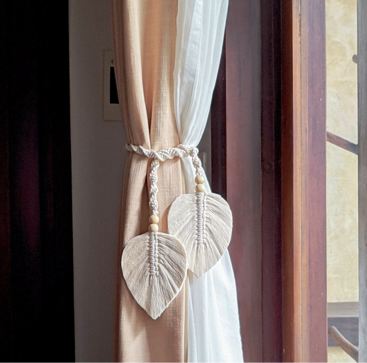 Dual feather curtain holder