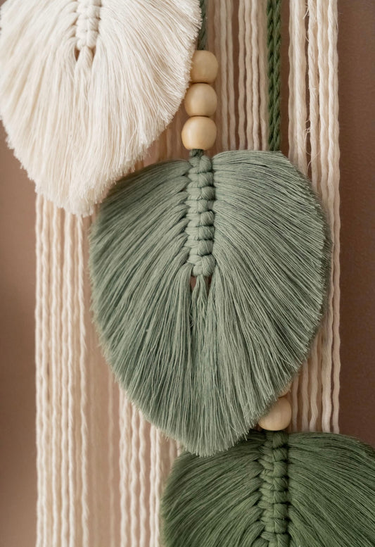 Small wall hanging with feathers