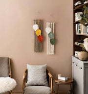 Small wall hanging with feathers