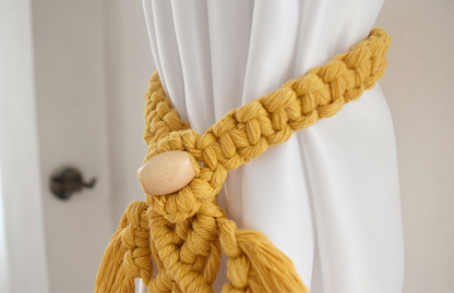 Feather curtain holder